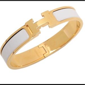 Hermès White Enamel Clic Clac Bracelet in Gold